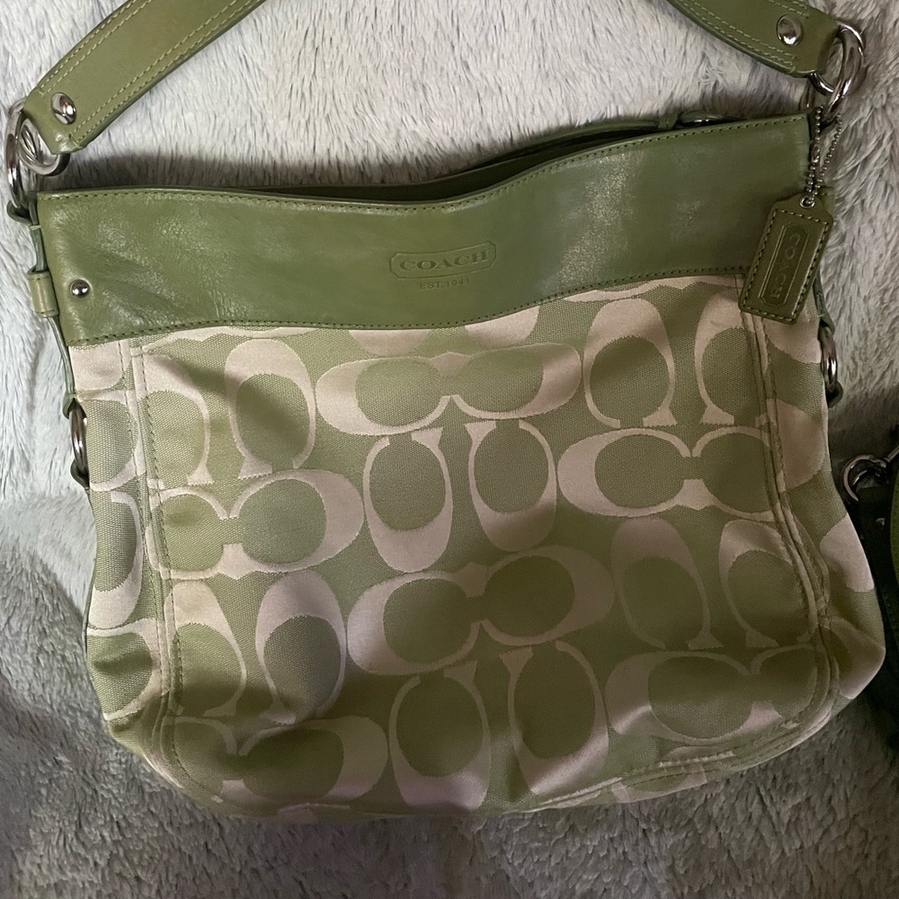 Coach with leather trim and extra long leather strap hobo signature